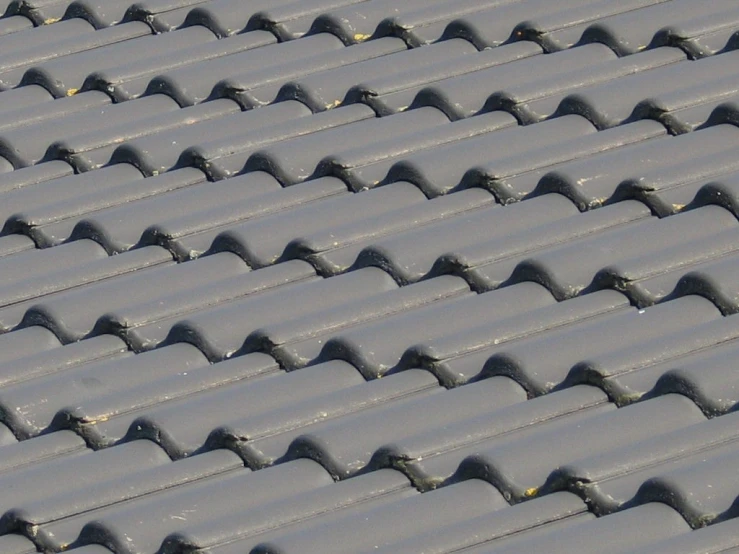 many gray colored roofs with lots of tiny ridges