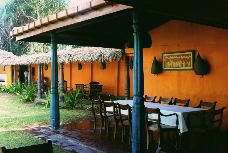 a small courtyard that has tables and chairs