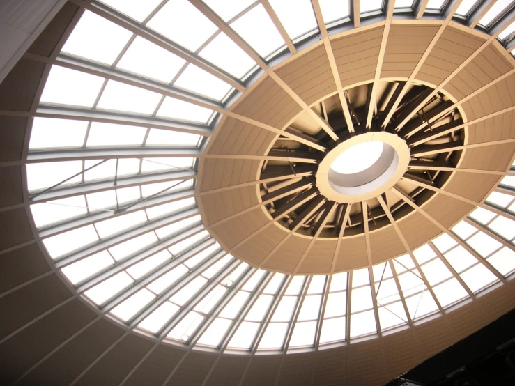 the view from underneath a ceiling fixture inside a building