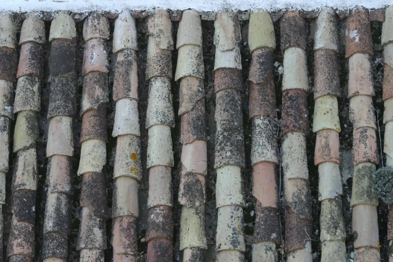 a close up view of a roof with tile