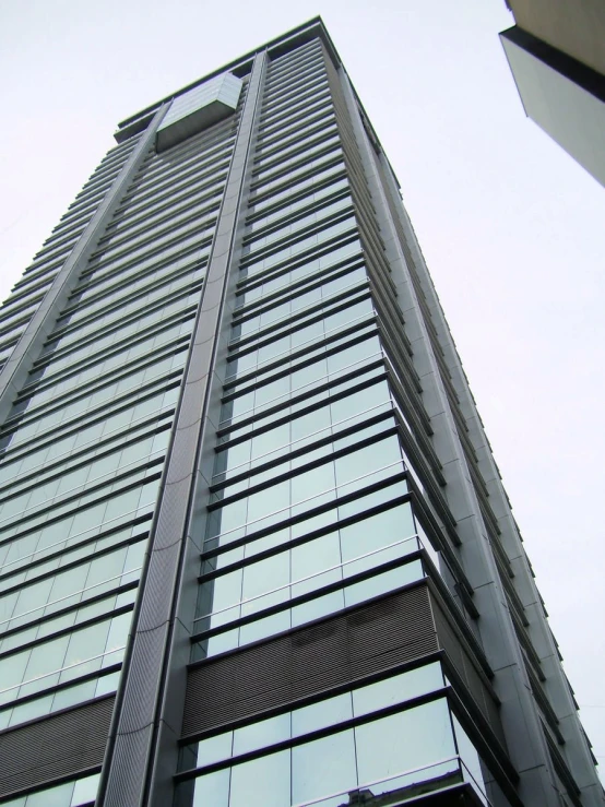 a large building with windows on the top of it