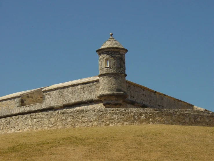 a large castle with a clock on it's side