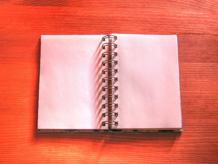 a closed journal on top of a table