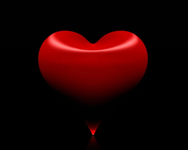 a red heart on a black background