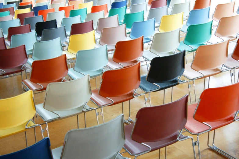 rows of colorful chairs lined up next to each other