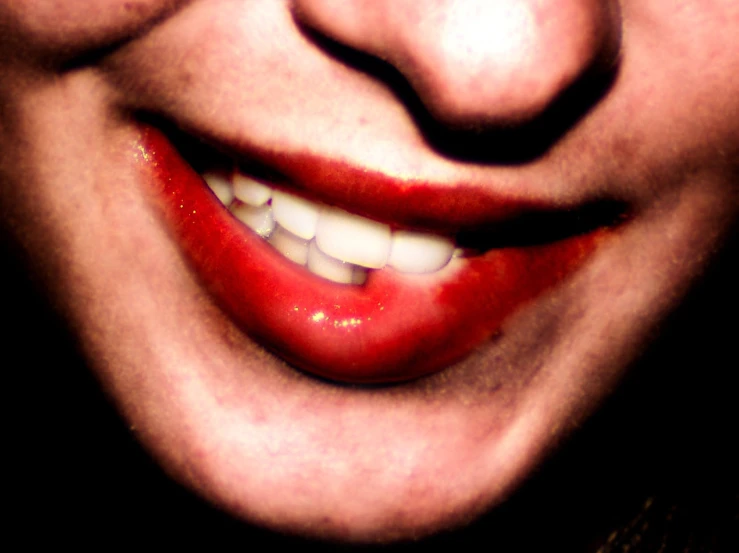 a person with their lip painted red