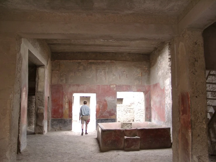 a man standing in a room with different textures