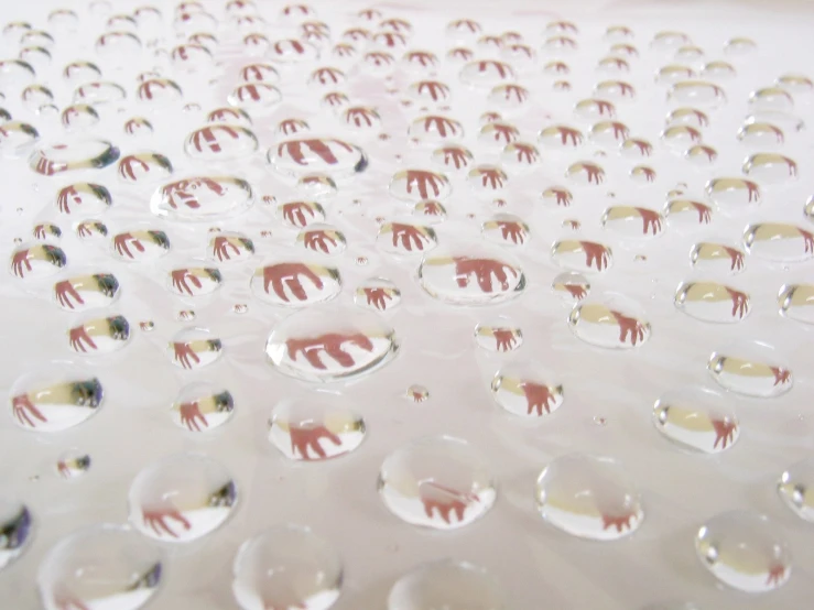 an assortment of little water droplets that look like elephants