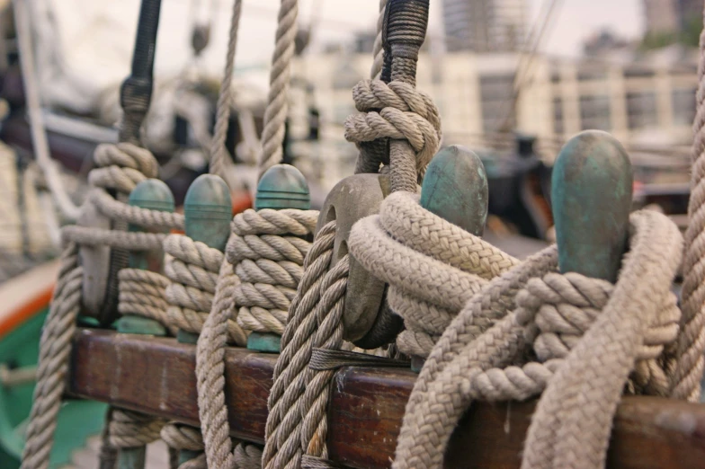 ropes of different colors and shapes of the rigs on a boat