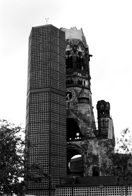 a tall clock tower next to a large building