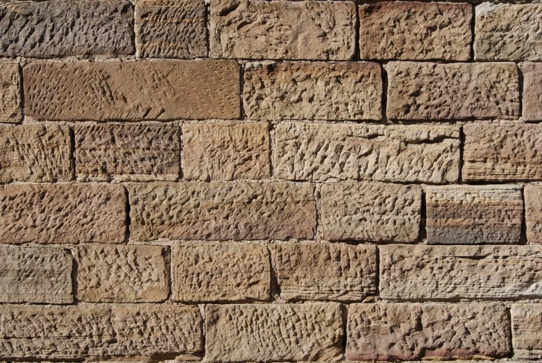 an image of a wall that is made out of brick