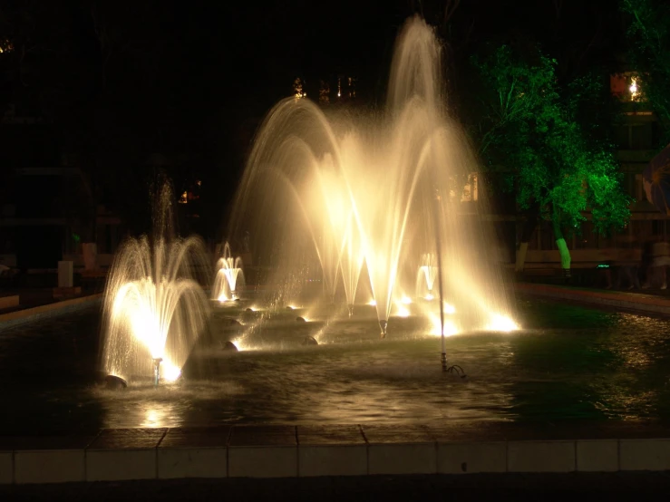 a large fountain that has multiple jets in it