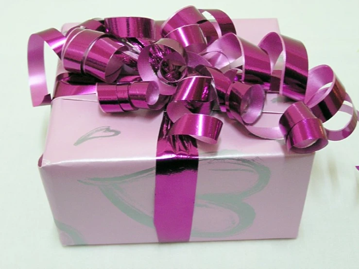 this is a present wrapped in purple ribbon