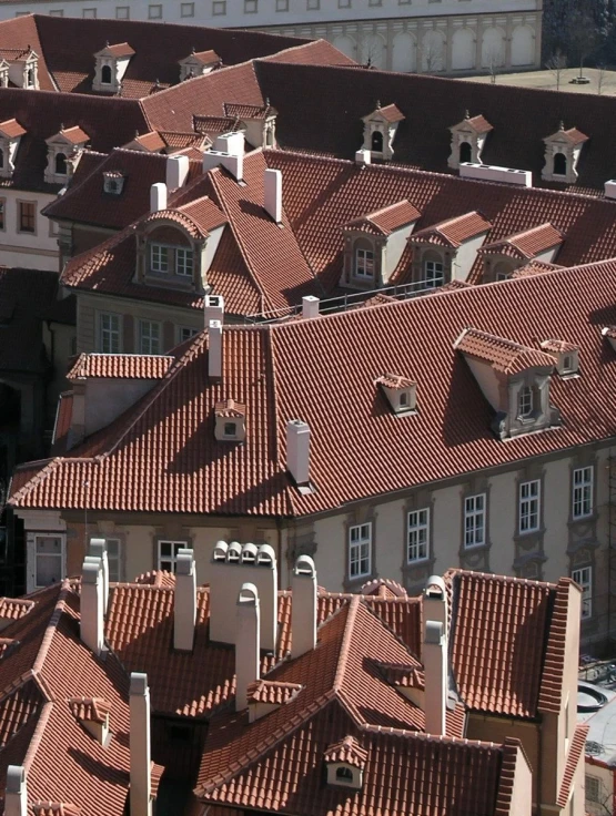 rooftops of city buildings near a busy street