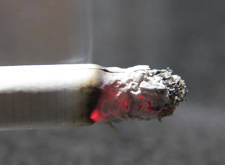 the tip of a cigarette burning red