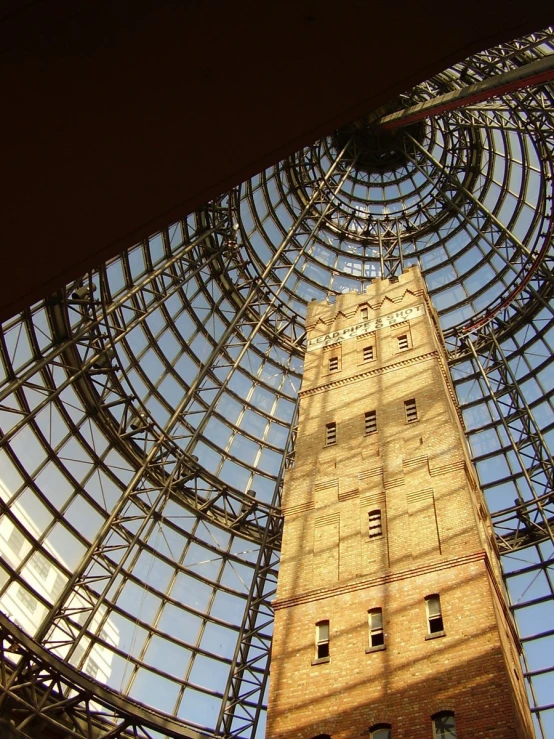 the glass walls are set high in the building's atrium