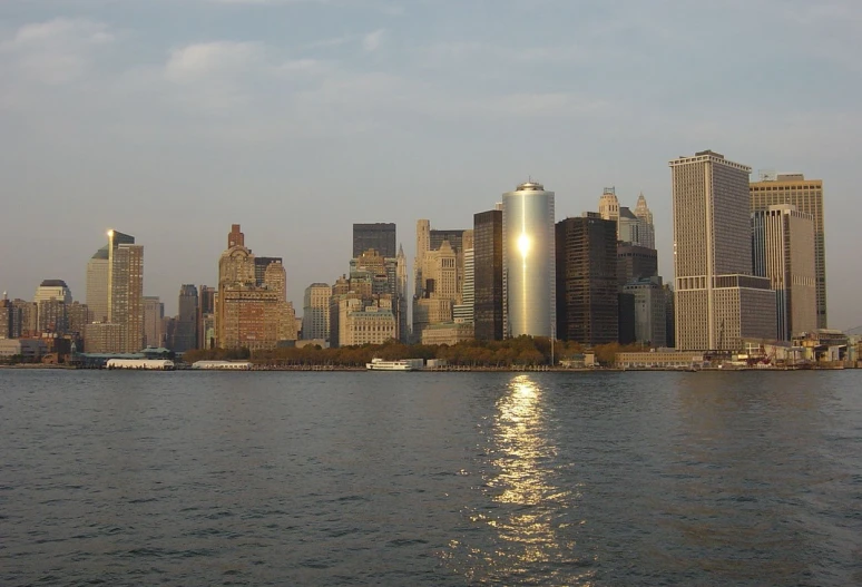 view of some tall buildings along side of the water