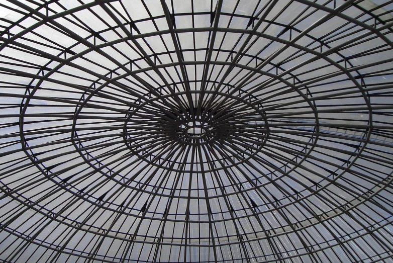 the ceiling of a building, with an artistic design