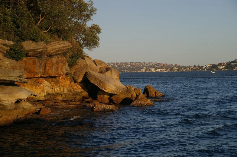 an image of rocks in the middle of water