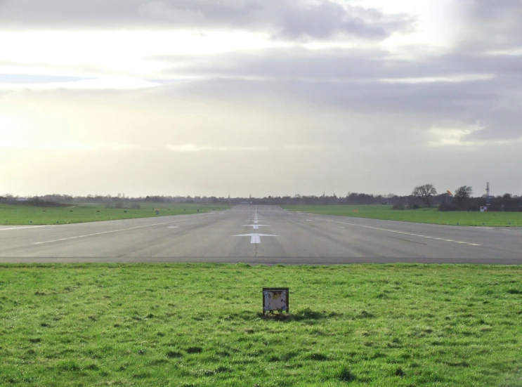 a airplane sitting on an airport runway