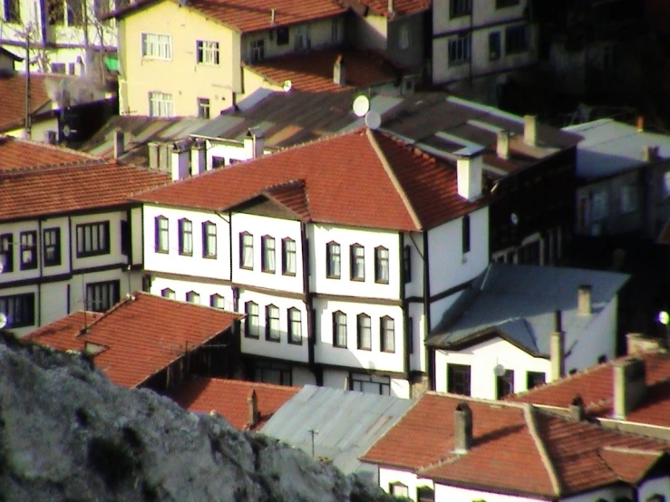 a hillside view showing an old european house