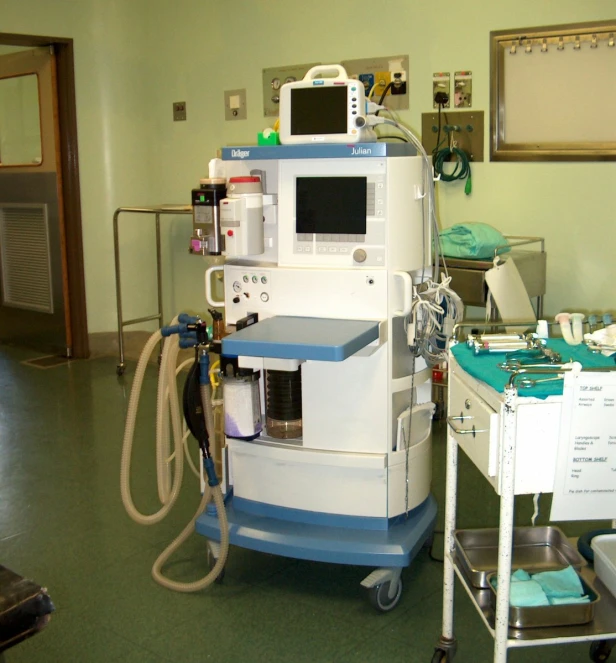 a large medical machine is on display in a hospital