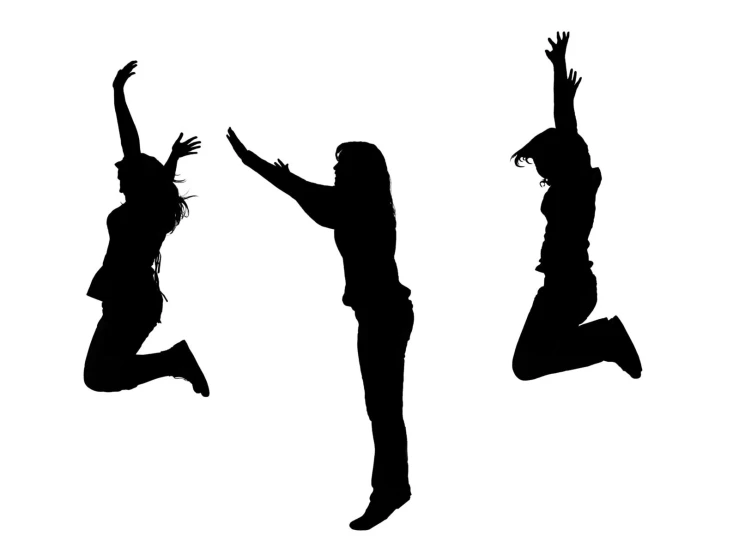 three silhouettes of people jumping up into the air