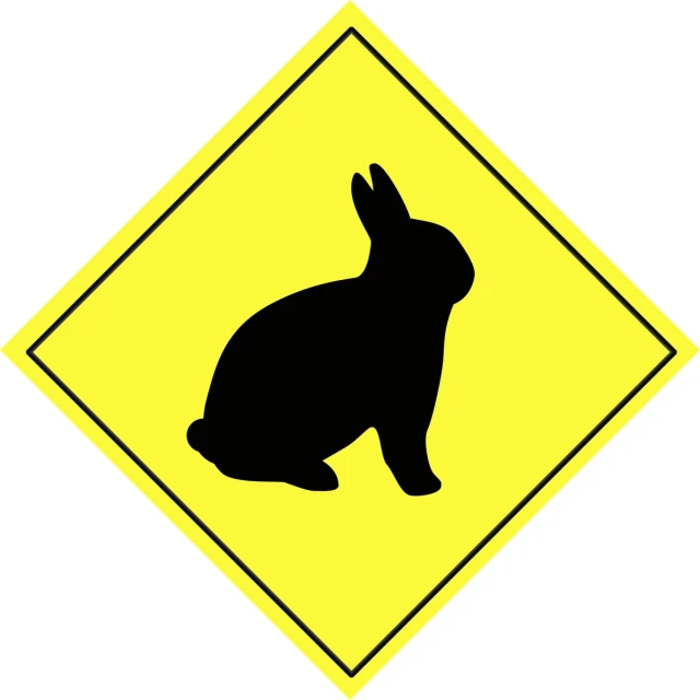an animal crossing sign that is yellow and black