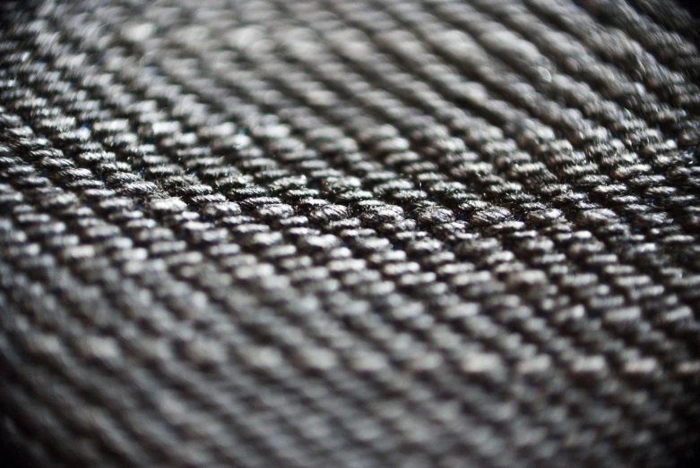 a closeup of a dark - grey woven cloth