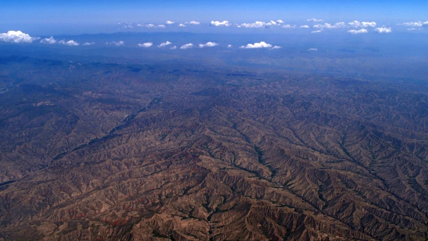 the view from an airplane flying high up in the air