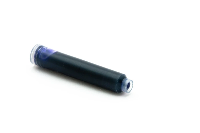 a black plastic cylinder with a blue cap
