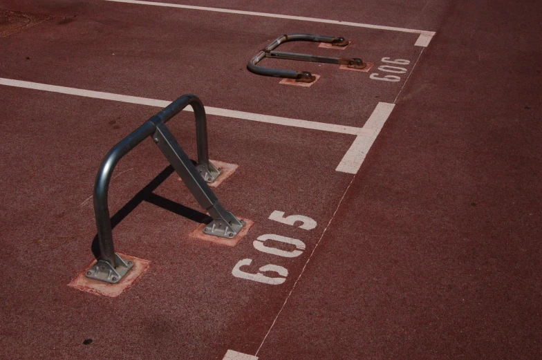 an empty parking lot with some equipment on it