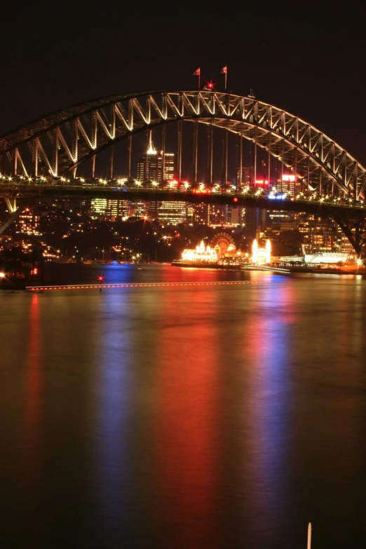 a bright picture of the sydney opera at night