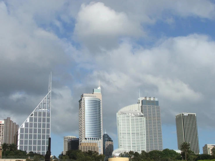 the view from a city river and tall buildings