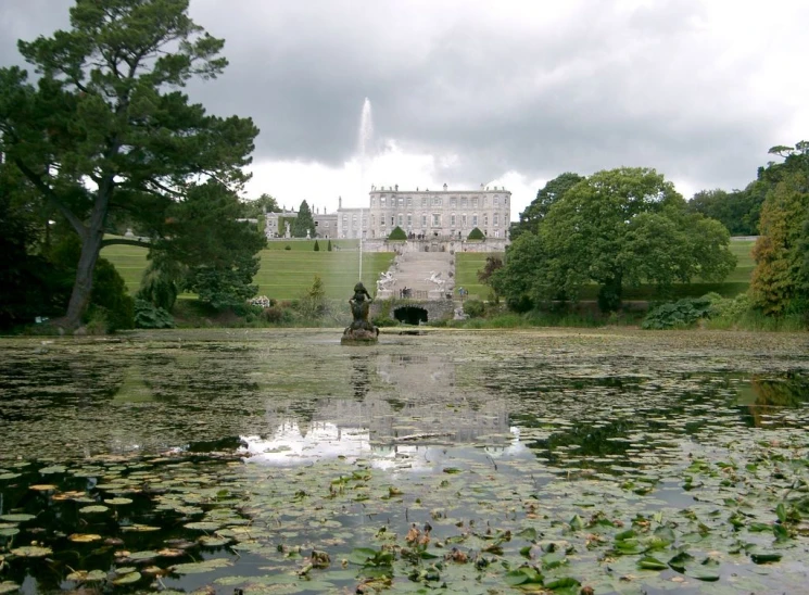 there is a big mansion surrounded by trees