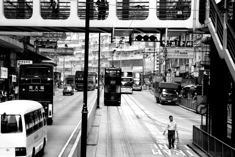 an individual is walking with their dog near the busy streets