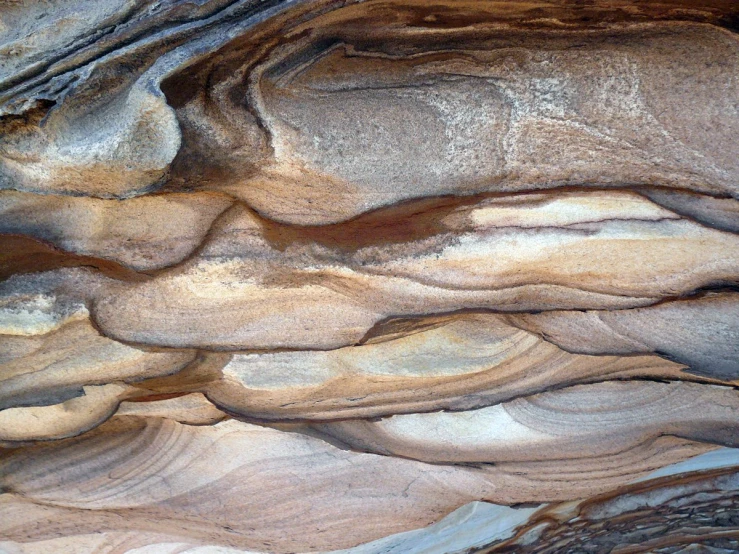 abstract patterns made with brown and tan rocks