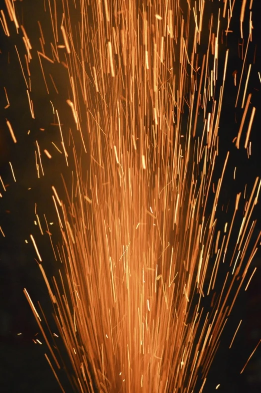 a dark po of a large firework