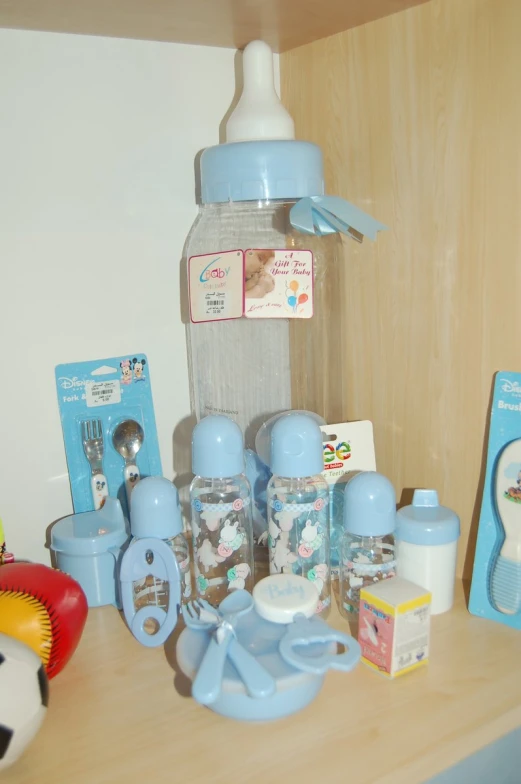 some baby feeding products on a wooden table