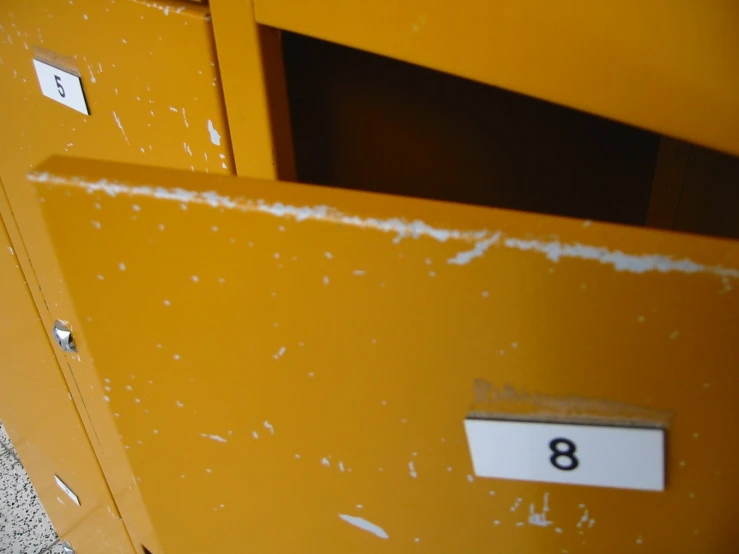 the door of a locker with the number 8