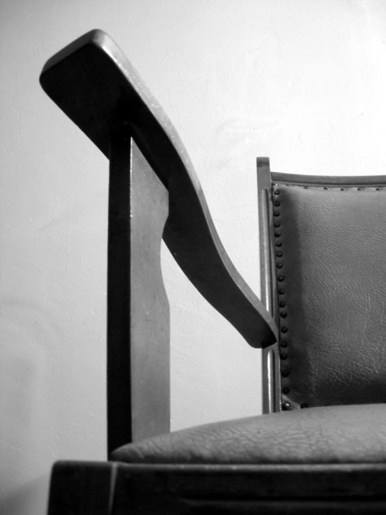 black and white pograph of a modern chair