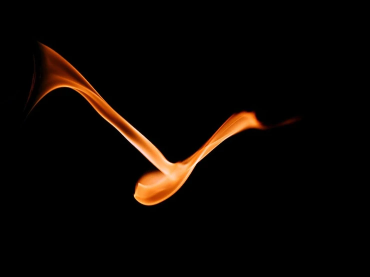 an orange wavy stream on a black background