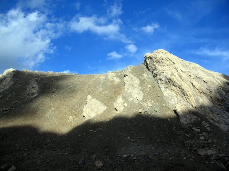 a mountain that has some snow on it