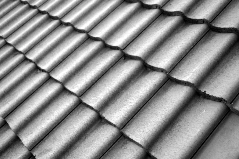 close up of roof tile shingles in black and white