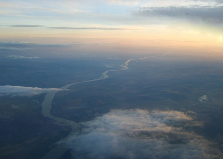 a view from a jet airplane on a very cloudy day