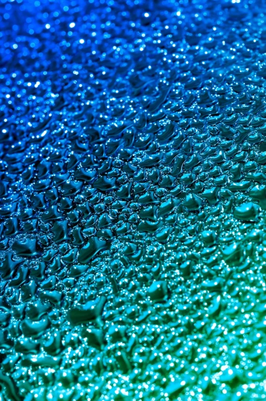 a close up image of rain droplets on glass