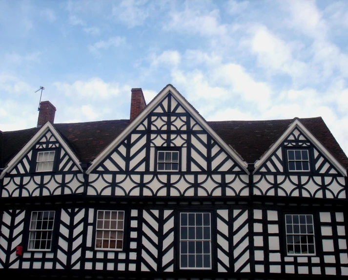 the roof of a house with many windows