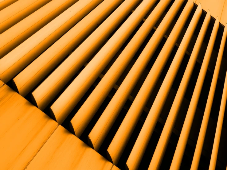 closeup of a building structure with an orange background