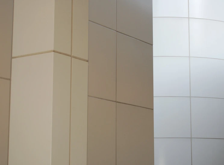 the tiles in this bathroom are neutral and clean