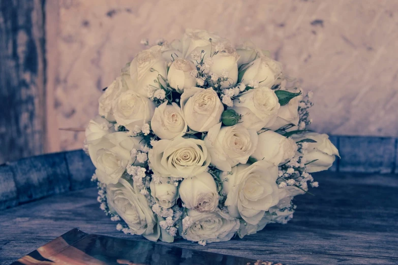 a bunch of white flowers on a table